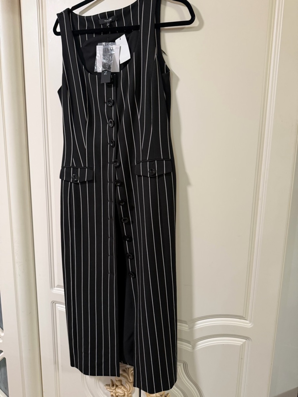 Sleeveless Black Pinstripe Button-Front Jumpsuit